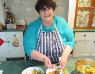 Penny Melville-Brown making food in her kitchen