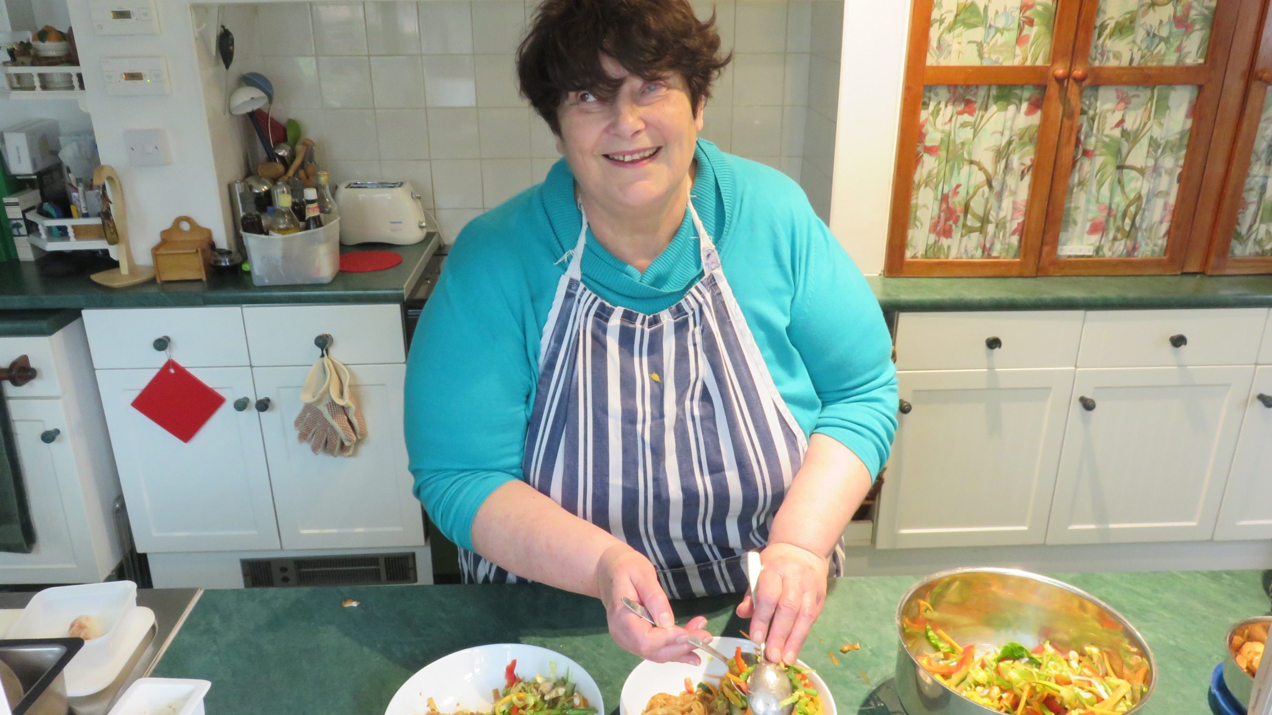 Penny Melville-Brown making food in her kitchen