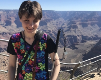 YES Summer Academy participants, Heaven, poses at the Grand Canyon