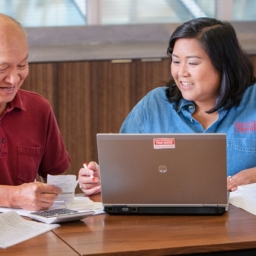 AARP Tax Aide Picture AARP Foundation Tax-Aide volunteer helps a program participant file their taxes