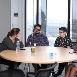 A group of LightHouse youth students sitting at a round table