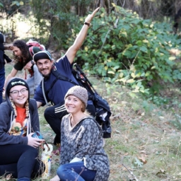 A group of teenage campers pose together on a hiking trail at Enchanted Hills Camp