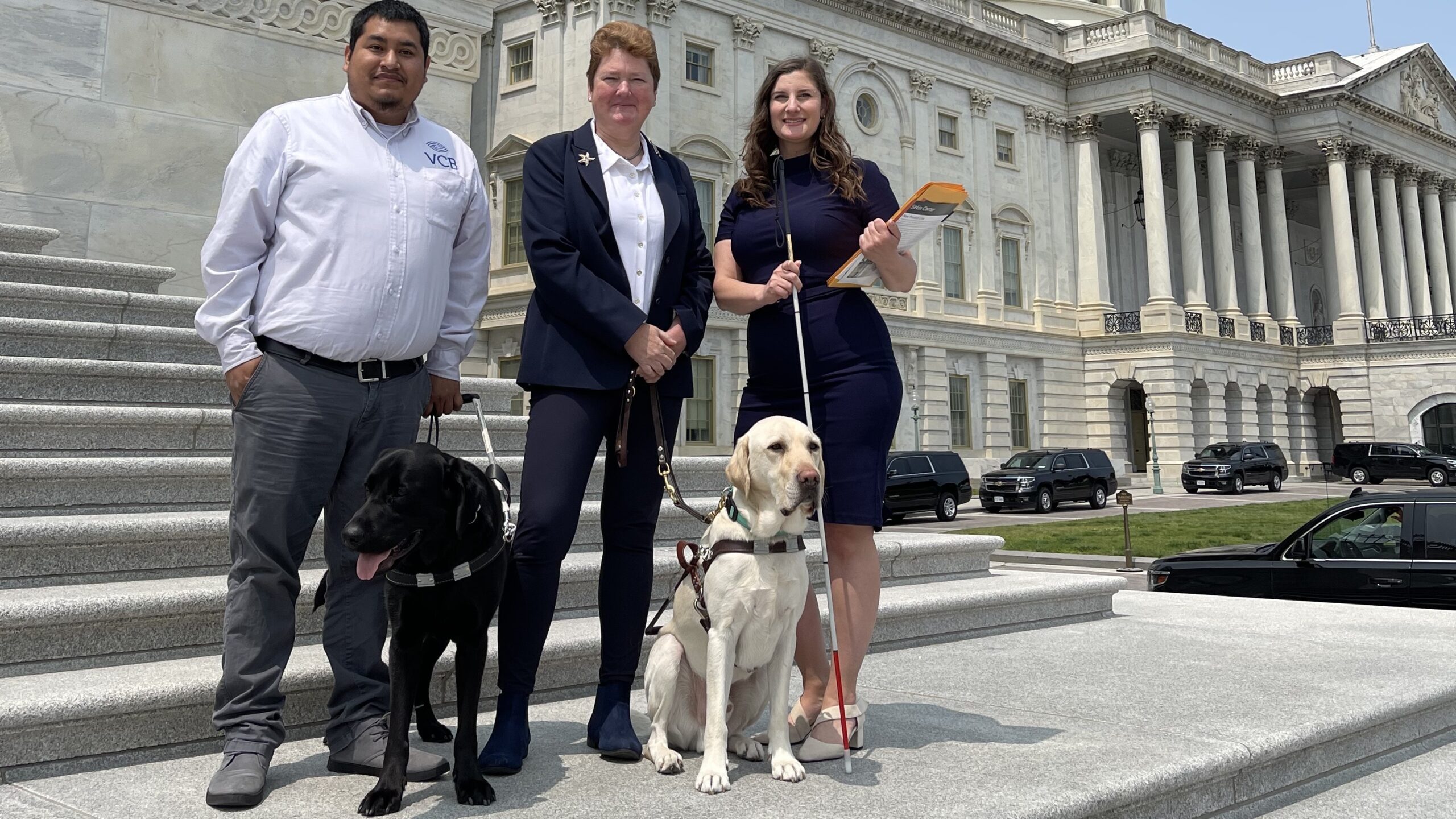Rey Villarreal, Sharon Giovinazzo and Caitlin O’Malior stand on the steps of Capitol Hill