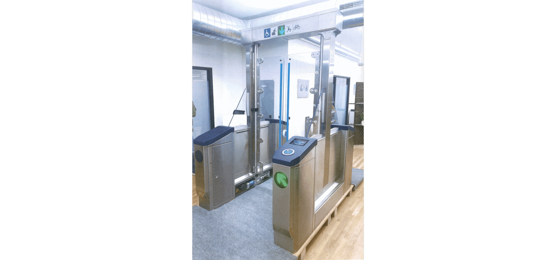Rendering of the new accessible fare gate at a BART station with five foot high clear swing doors
